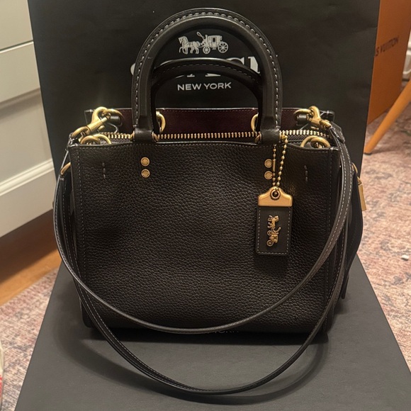 Coach Handbags - Coach Black Shoulder Bag with Gold Accents